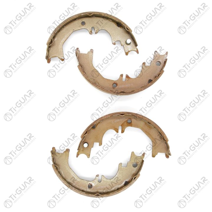 Тормозные колодки (КОМПЛЕКТ 4шт/РУЧНОГО ТОРМОЗА) TG-46540-60060/FN0642* Ti·GUAR